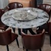 Rounded Stone Table with Premium Leather Chairs