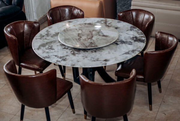 Rounded Stone Table with Premium Leather Chairs