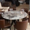 Rounded Stone Table with Premium Leather Chairs